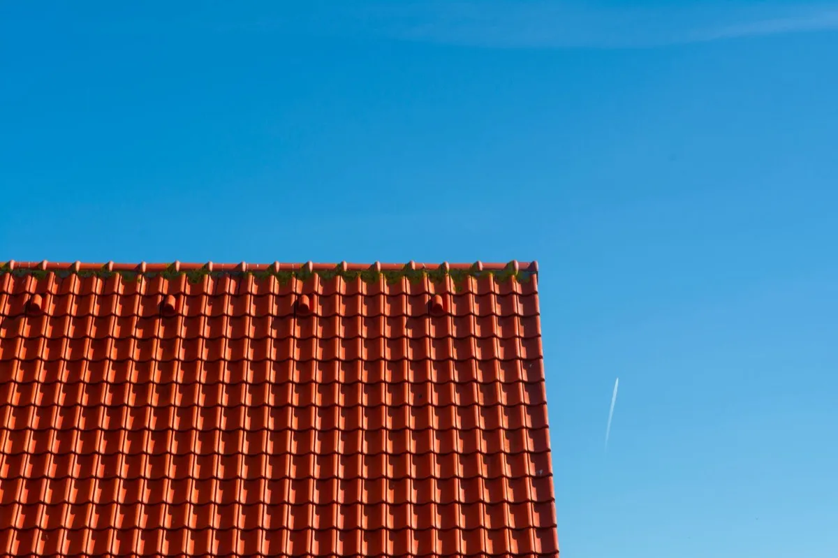 Tile roof gable in full sun, the kind of exposure that sets roof life in Marshall, TX